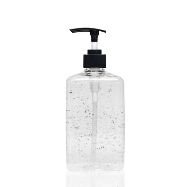 hand sanitizer alcohol gel in transparent plastic bottle pump isolated on white background for disinfection, prevent spreading of germs during infections of COVID-19 Coronavirus outbreak situation